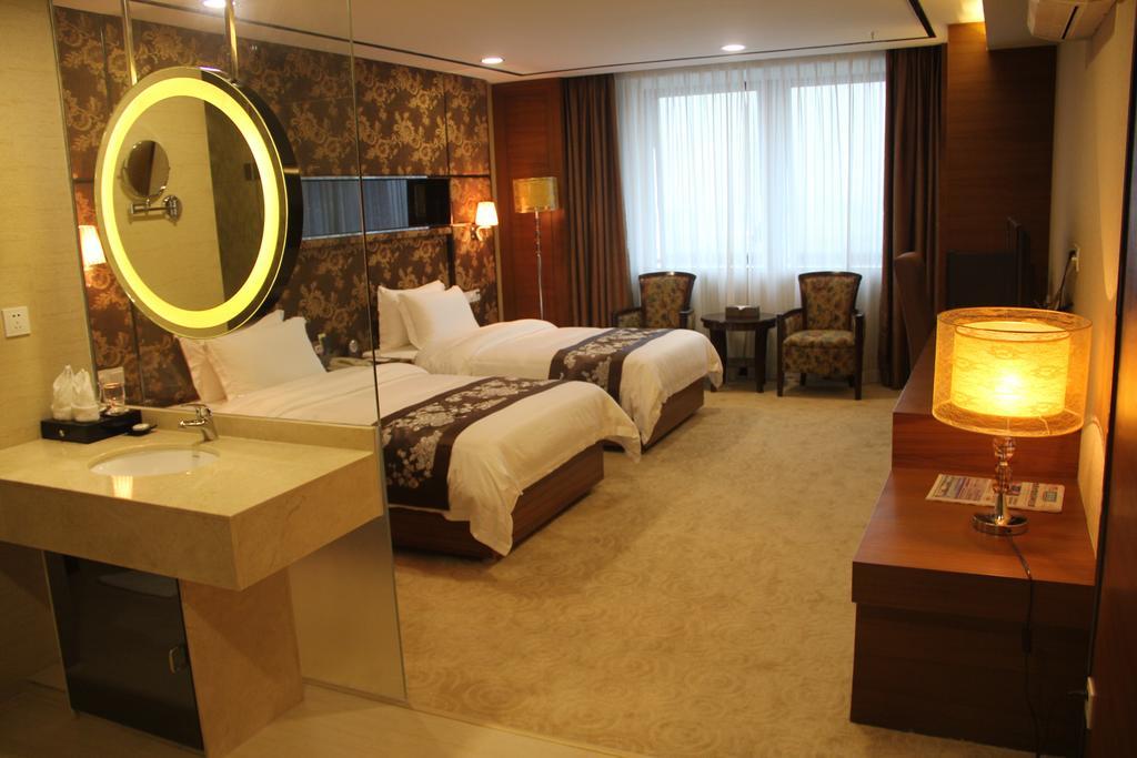 Hy Hotel Cantón Habitación foto